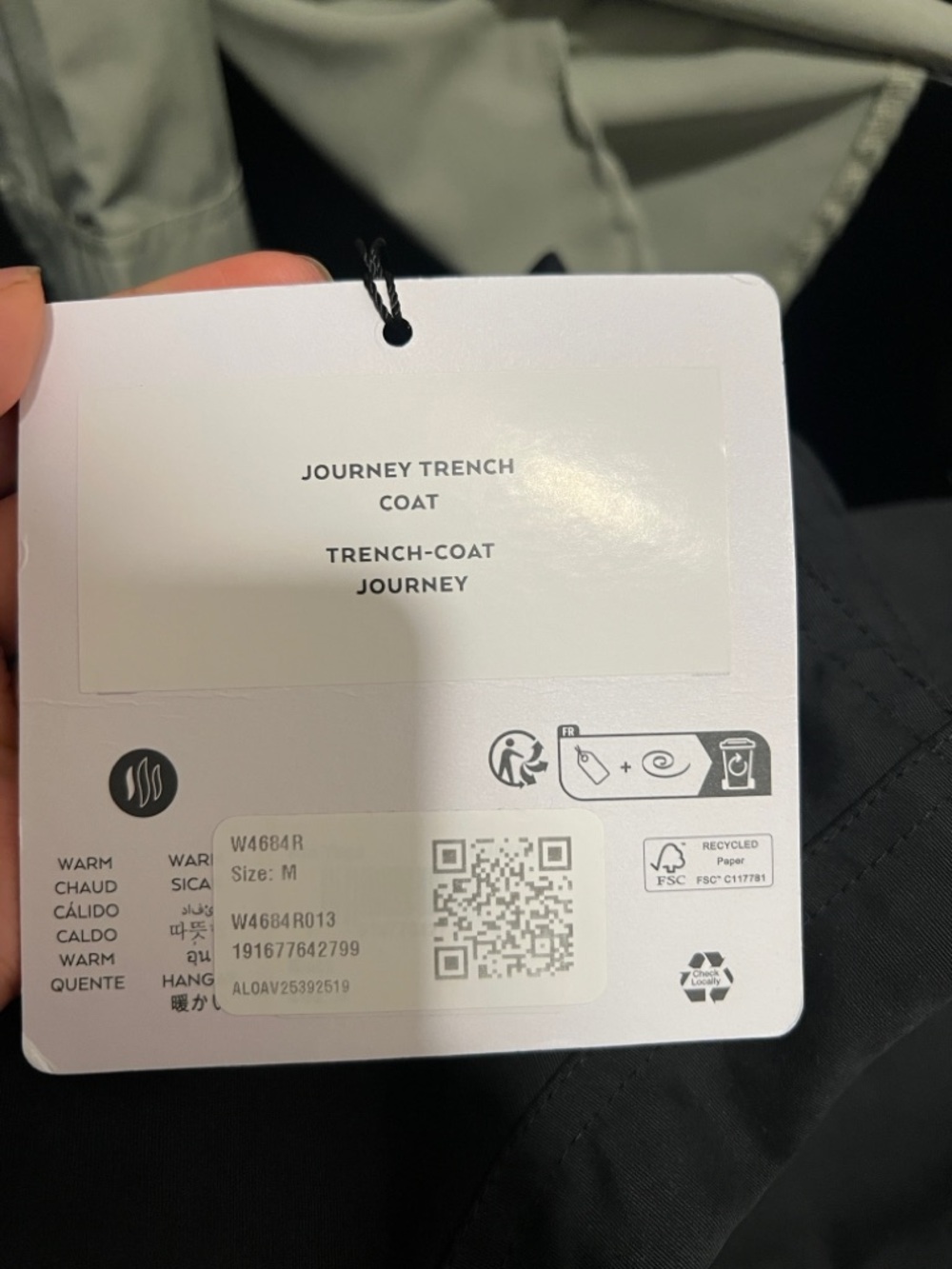 ALO Yoga Tag on Black Apparel - White/Black